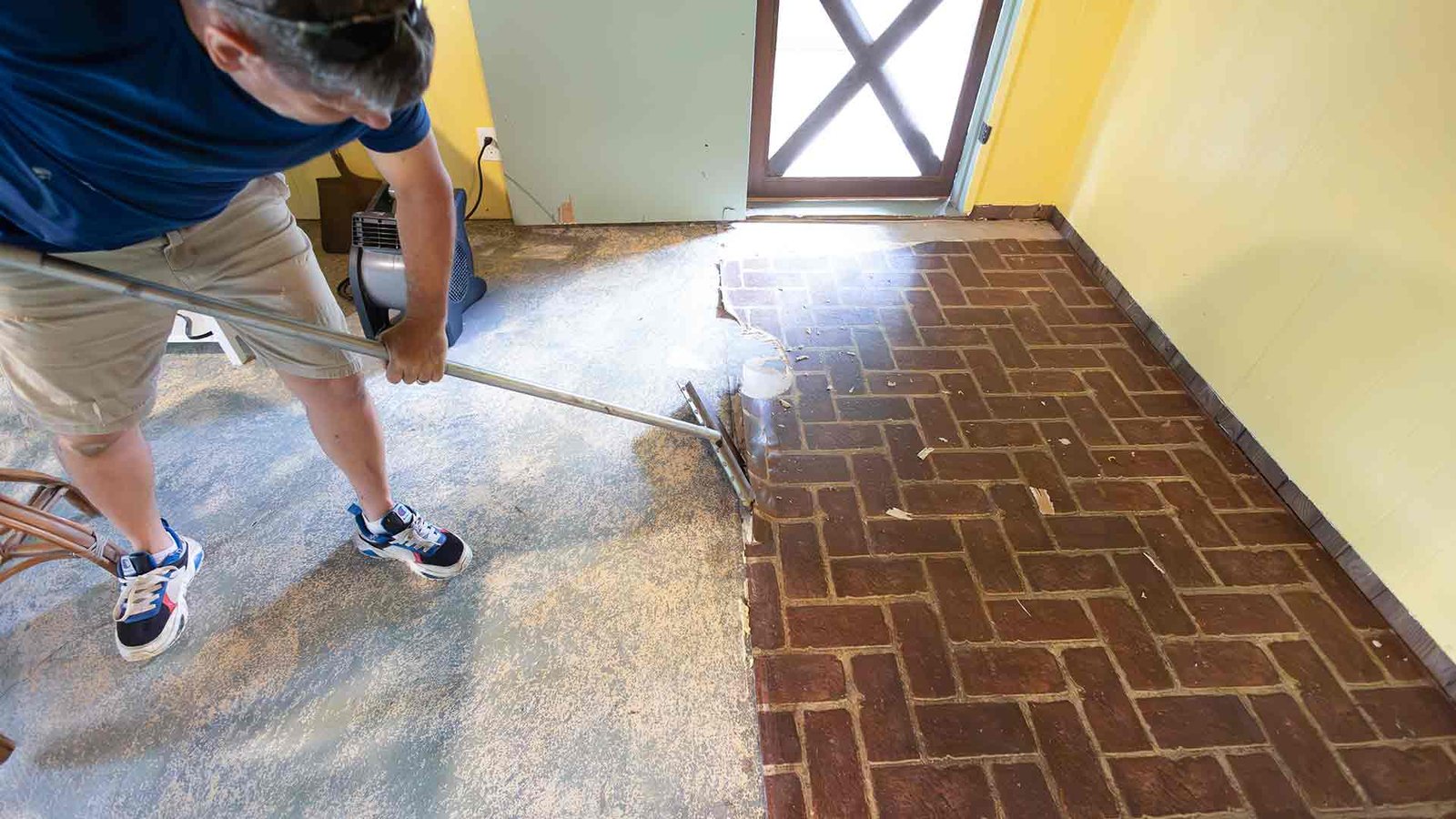 Rob scraping flooring