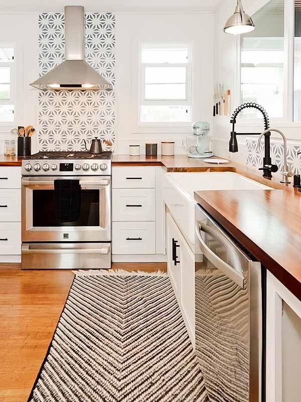 kitchen-sink-oven-hood-construction-service kitchen with oven hood and wood counters